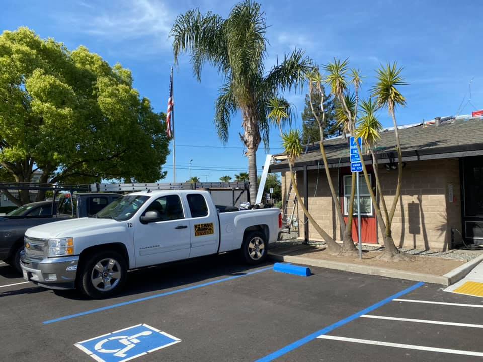 NuShake Roofing crew re-roofing the Lathrop-Manteca Fire District, Manteca, CA