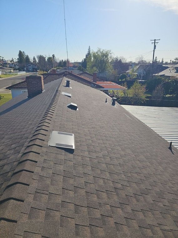 New tile roof installed by NuShake Roofing