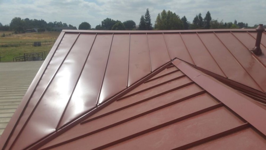 Standing-seam metal roof installed by NuShake Roofing