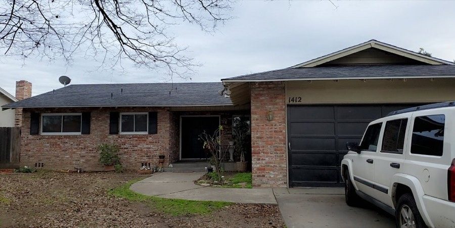 Completed low-slope roof on a Central Valley home