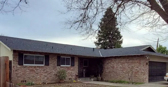 Full roof replacement on a brick home by NuShake Roofing