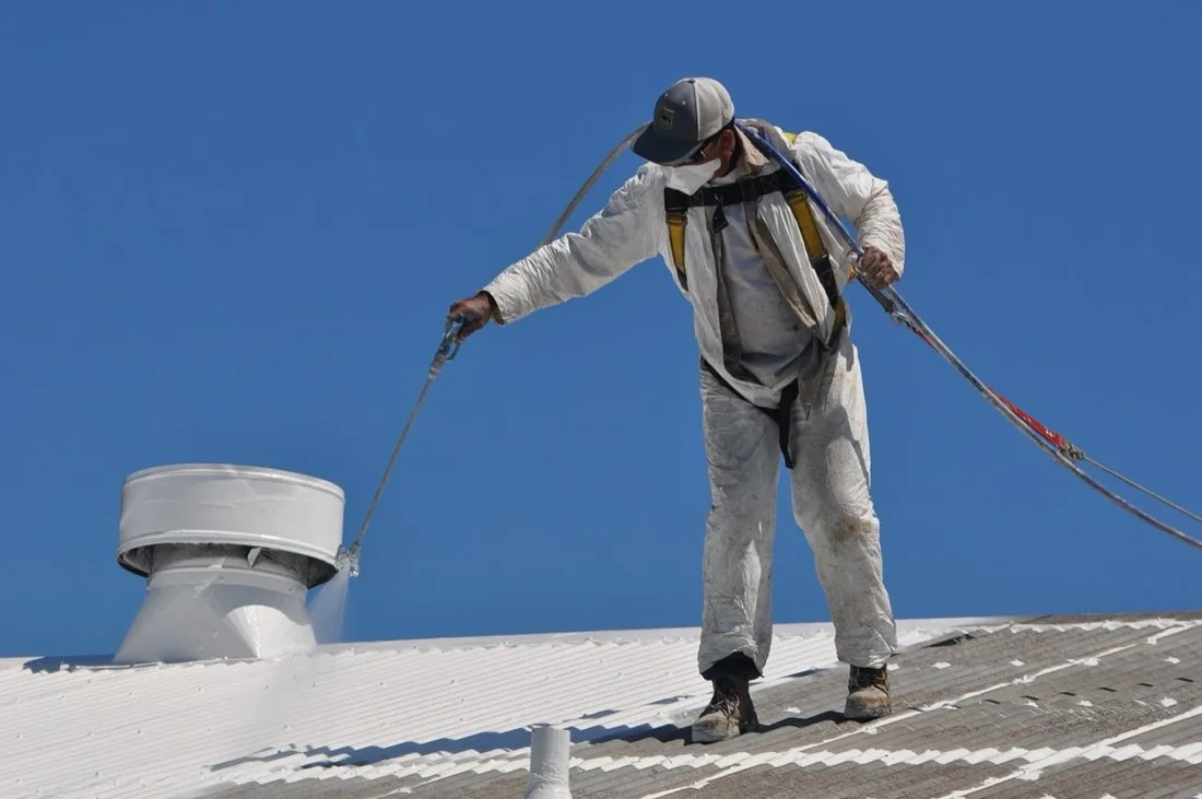 Protective roof coating applied by NuShake Roofing